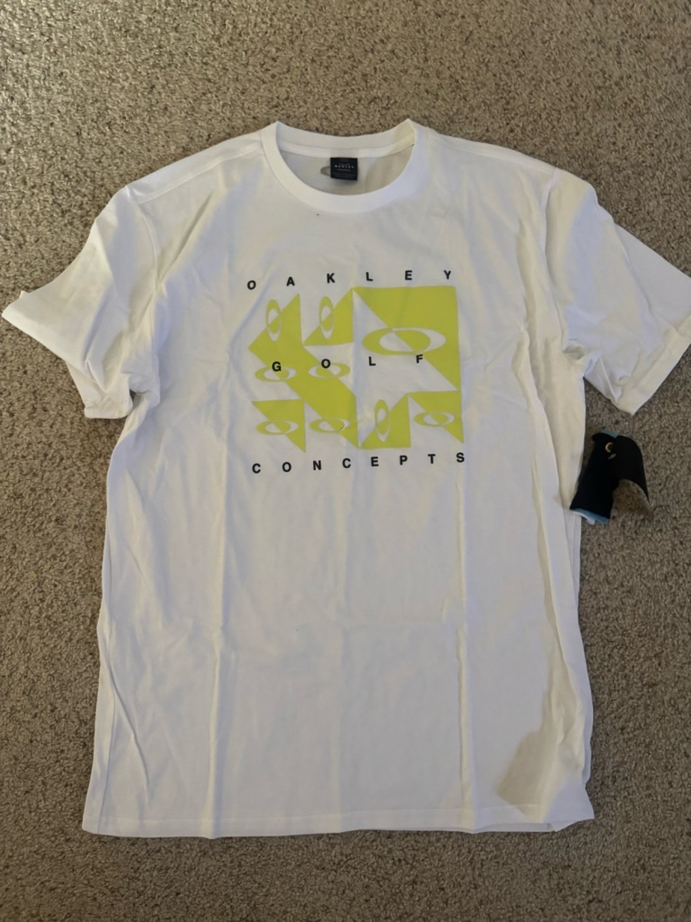 Oakley White Short-Sleeve Golf Graphic Tee with Yellow-Green Print
